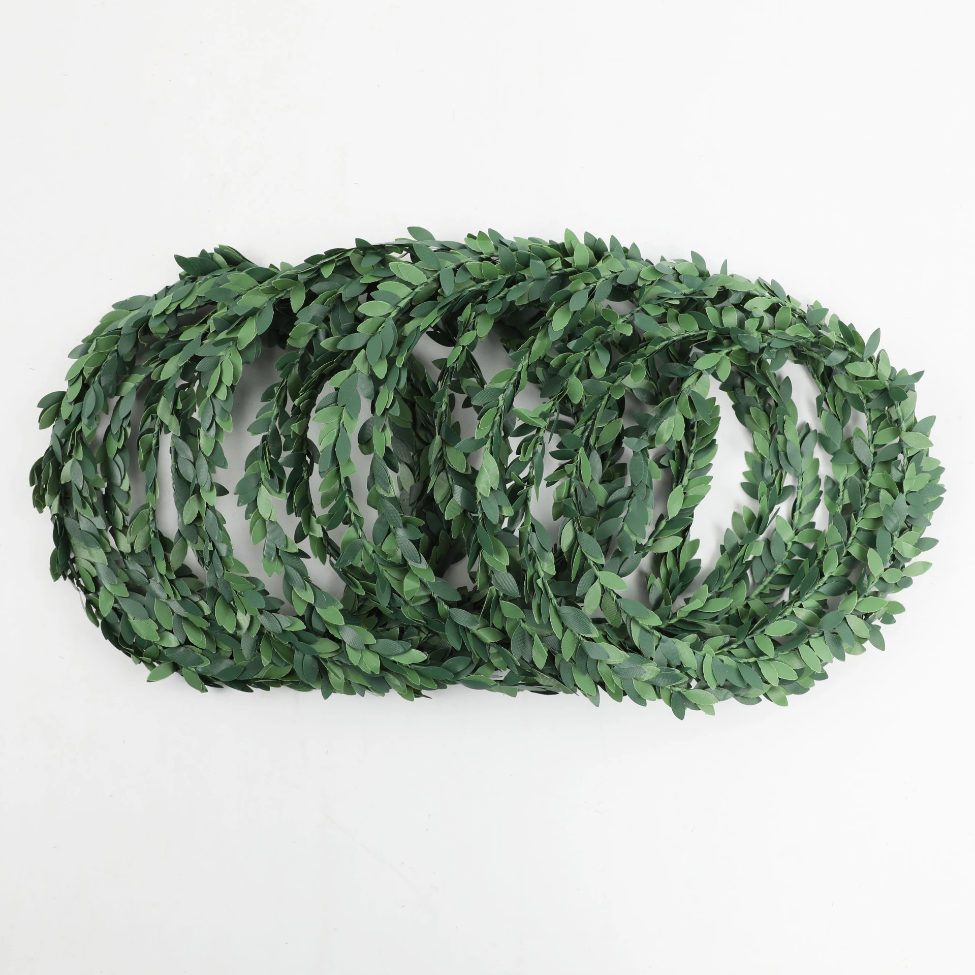 Multiple coils of artificial 7.5 m leaf garland