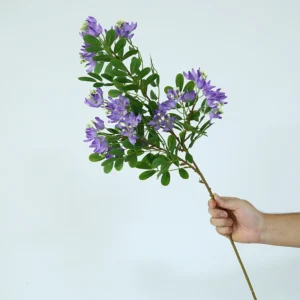 Purple artificial albizia flower branch