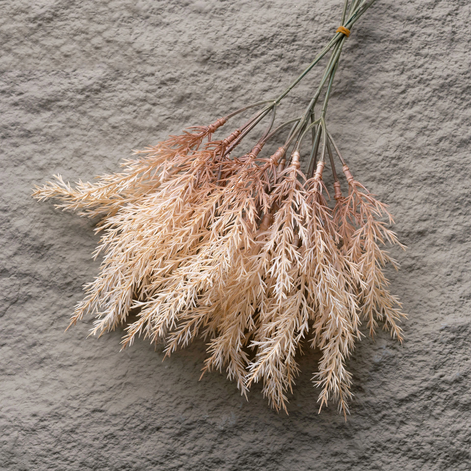 Close-up of cream artificial astilbe bush