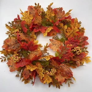 Artificial autumn maple leaf wreath with gold berry clusters