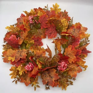 Artificial autumn maple leaf wreath with pink berry clusters