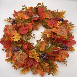 Artificial autumn maple leaf wreath with plum berry clusters