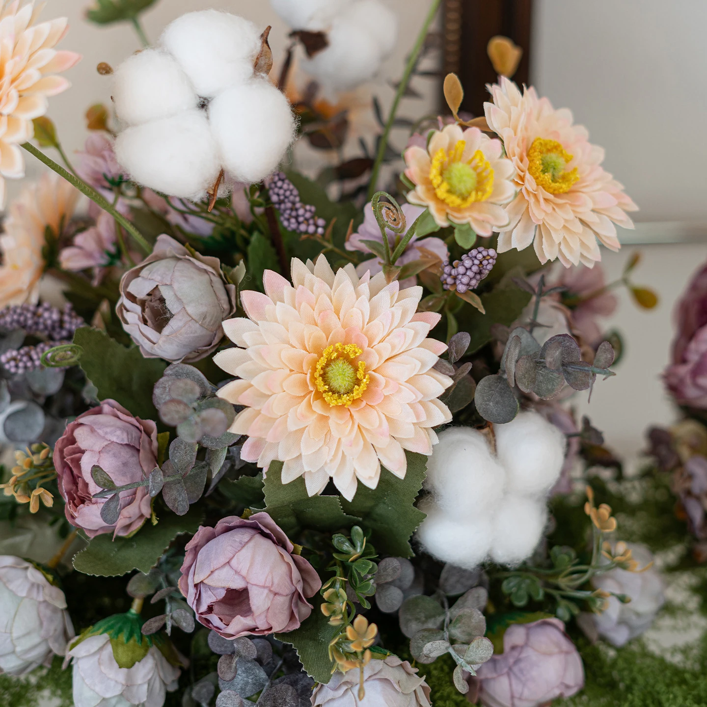 Close-up of cotton daisy artificial autumn mixed flower table arrangement collection