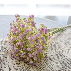Alternate tabletop view of a lavender and white artificial baby's breath bouquet