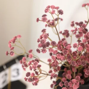 Close-up of burgundy detail for artificial baby's breath spray