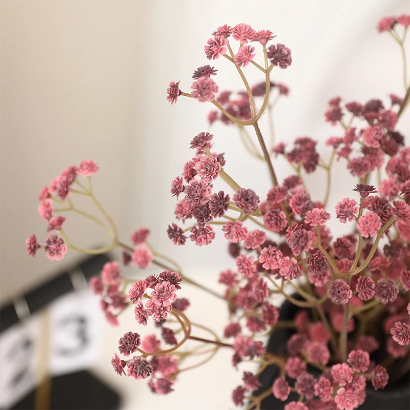 Close-up of burgundy detail for artificial baby's breath spray