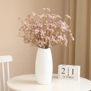 Artificial Baby's Breath Spray shown in light pink vase application