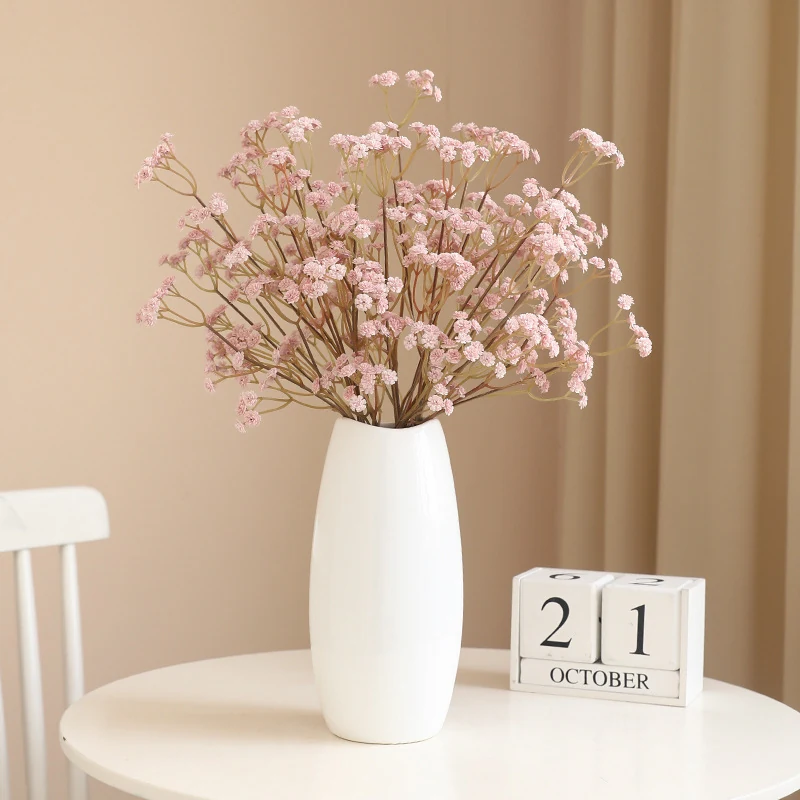 Artificial Baby's Breath Spray shown in light pink vase application