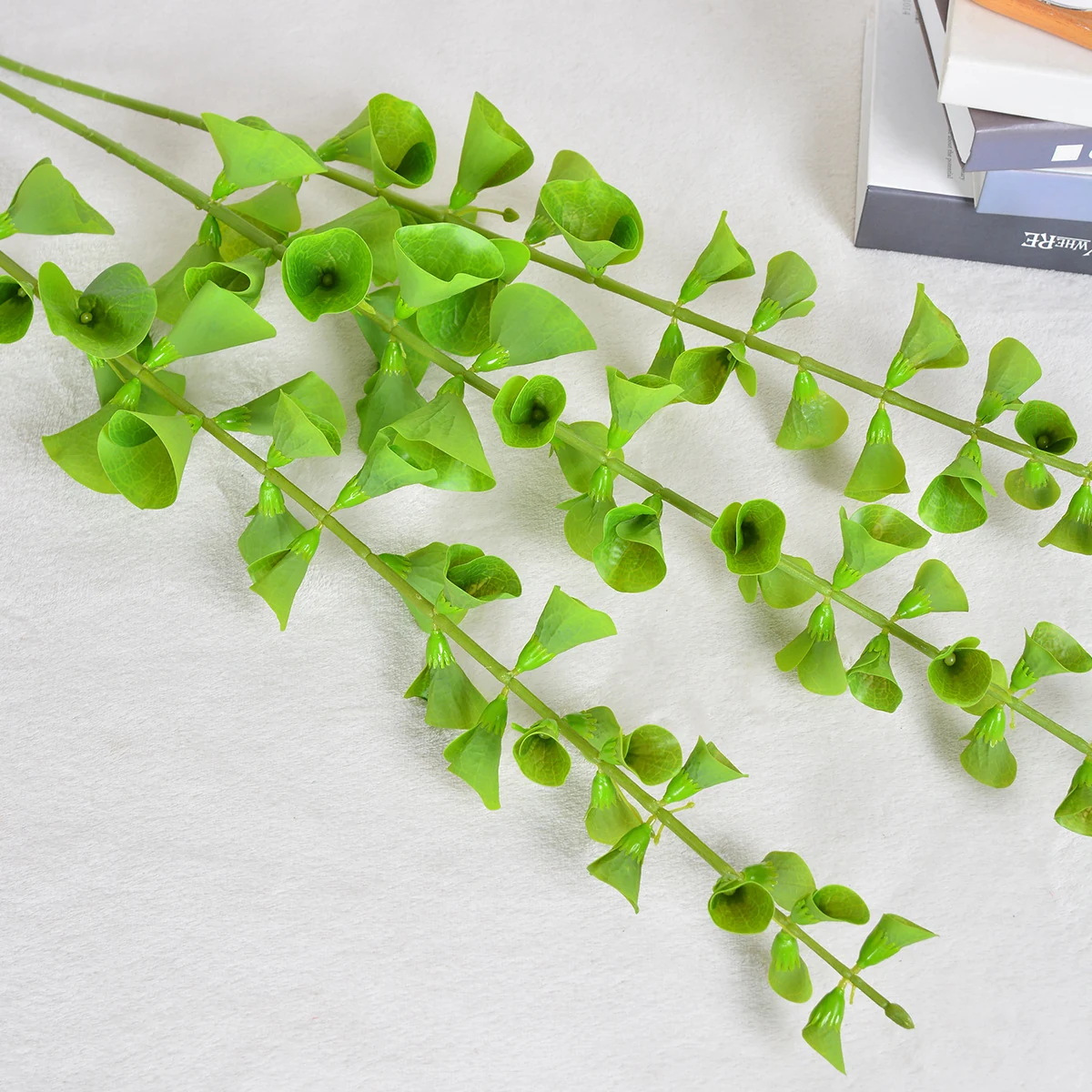 Artificial Bells of Ireland Stem shown in spaced bloom application