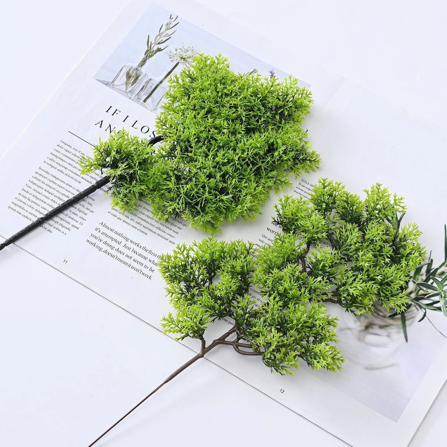 Compact-cluster and open-canopy artificial bonsai stems in a styled display