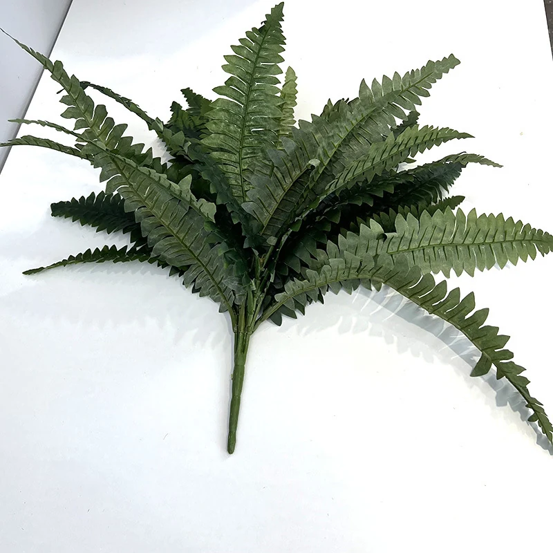 White Background artificial boston fern bush