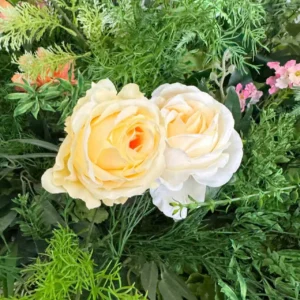 Close-up of rose artificial cascading wedding aisle flower arrangement