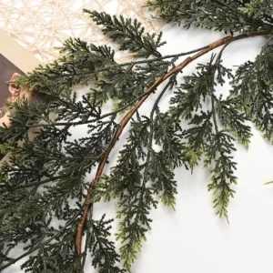 Wrapped central stem and branch connections of artificial cedar garland