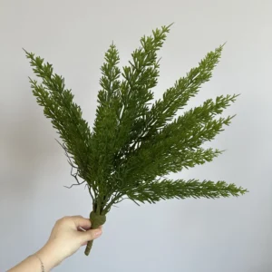 Alternate view of dark green artificial cedar greenery bush
