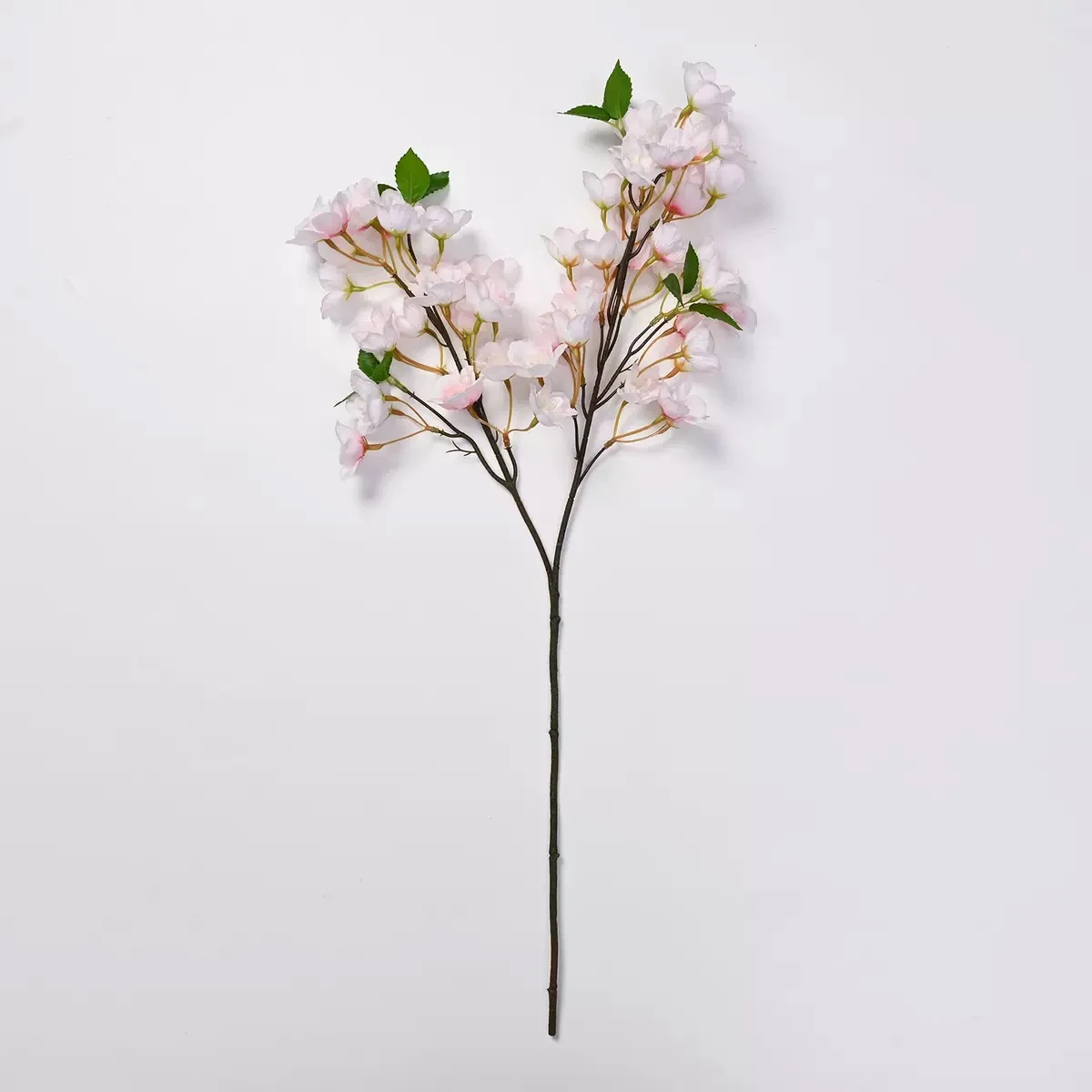 Full-length light pink artificial cherry blossom branch