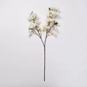 White artificial cherry blossom branch