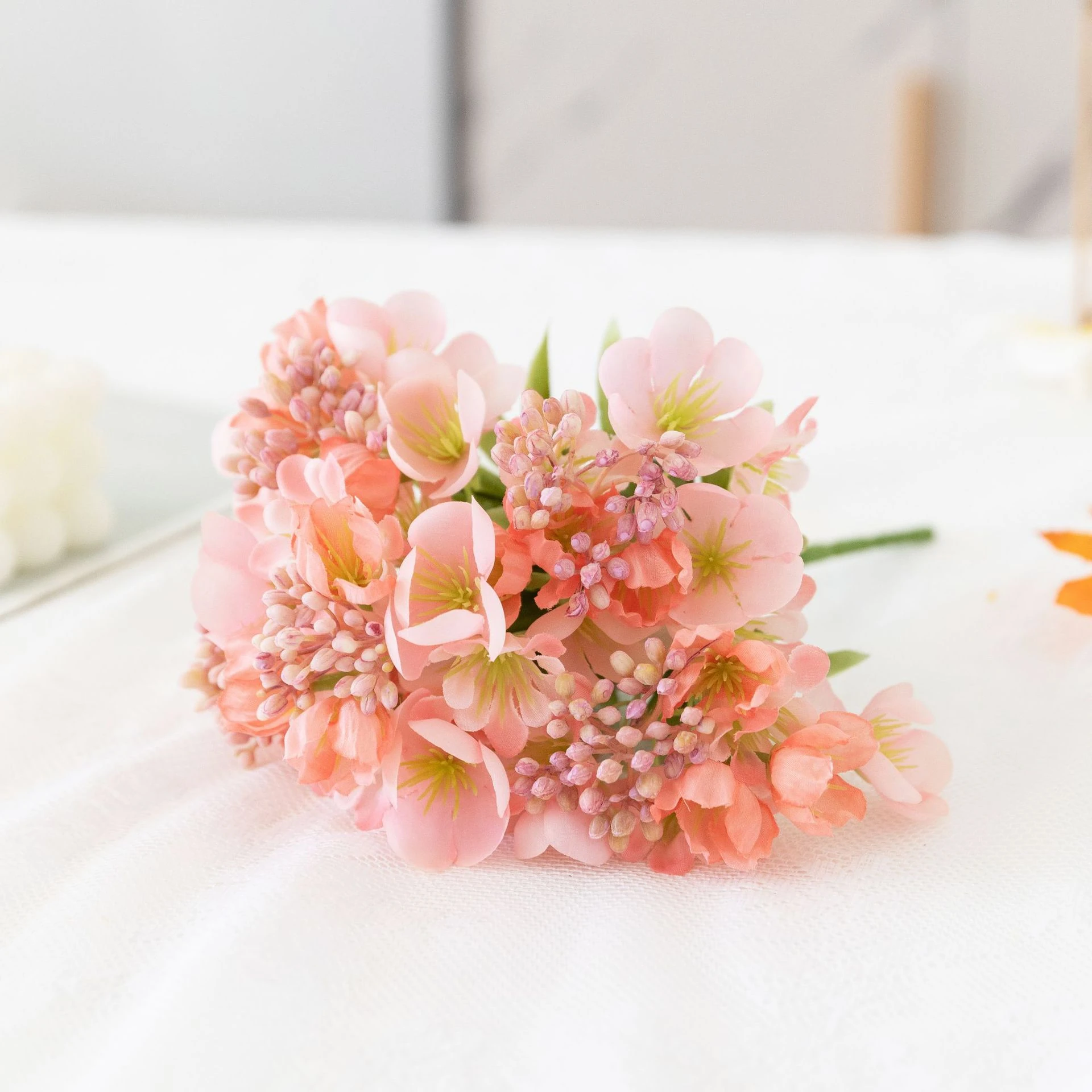 Close-up of pink artificial cherry blossom bush