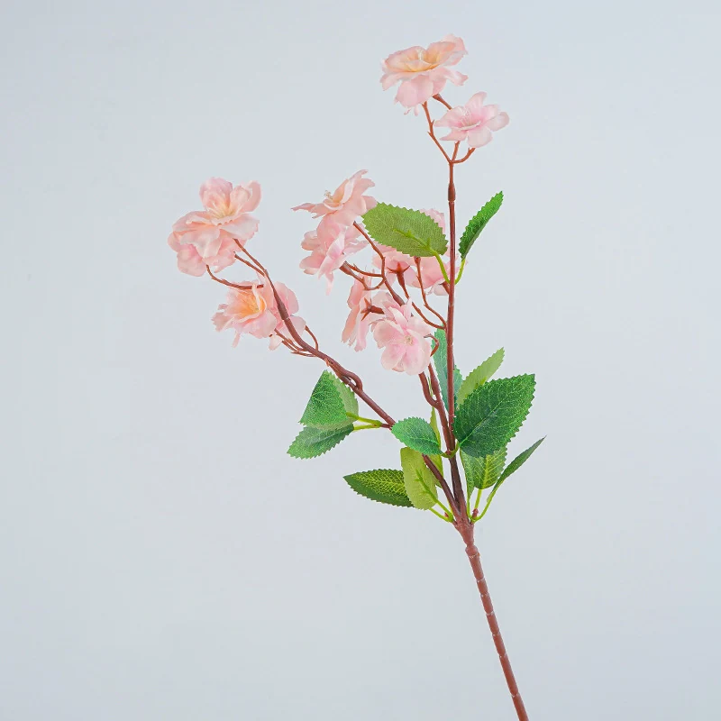 Pink artificial cherry blossom spray