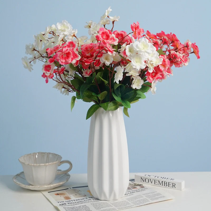 Artificial Cherry Blossom Spray shown in vase application