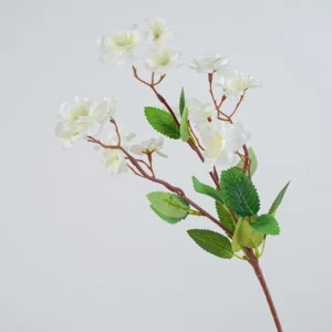 Close-up of white detail for artificial cherry blossom spray