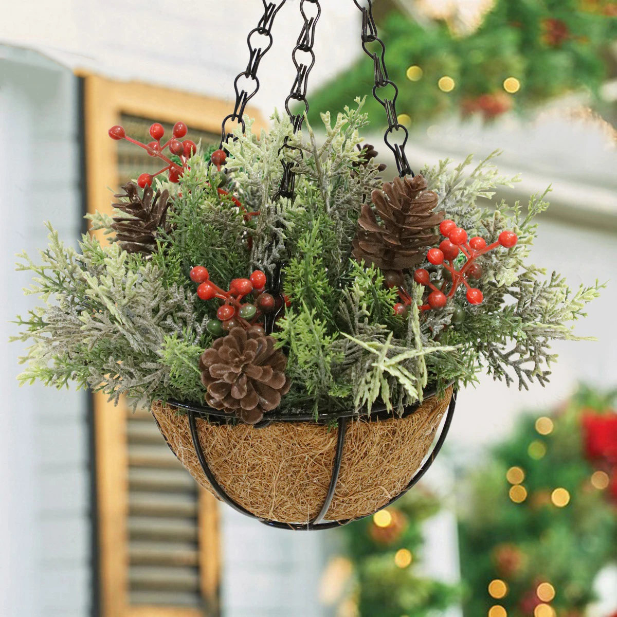 Artificial Christmas Pine Berry Hanging Basket displayed for window