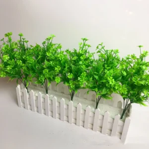 Artificial Clover and Fern Greenery Bush arranged for decorative display