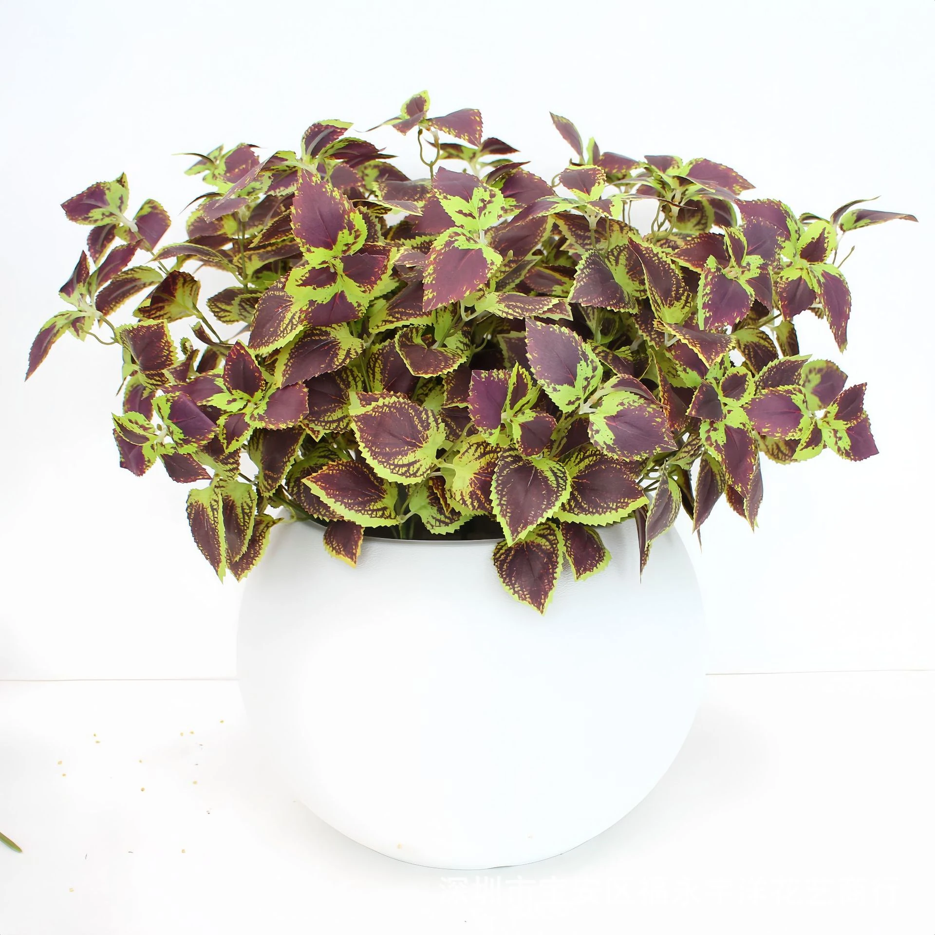 Artificial Coleus Bush displayed for decorative use