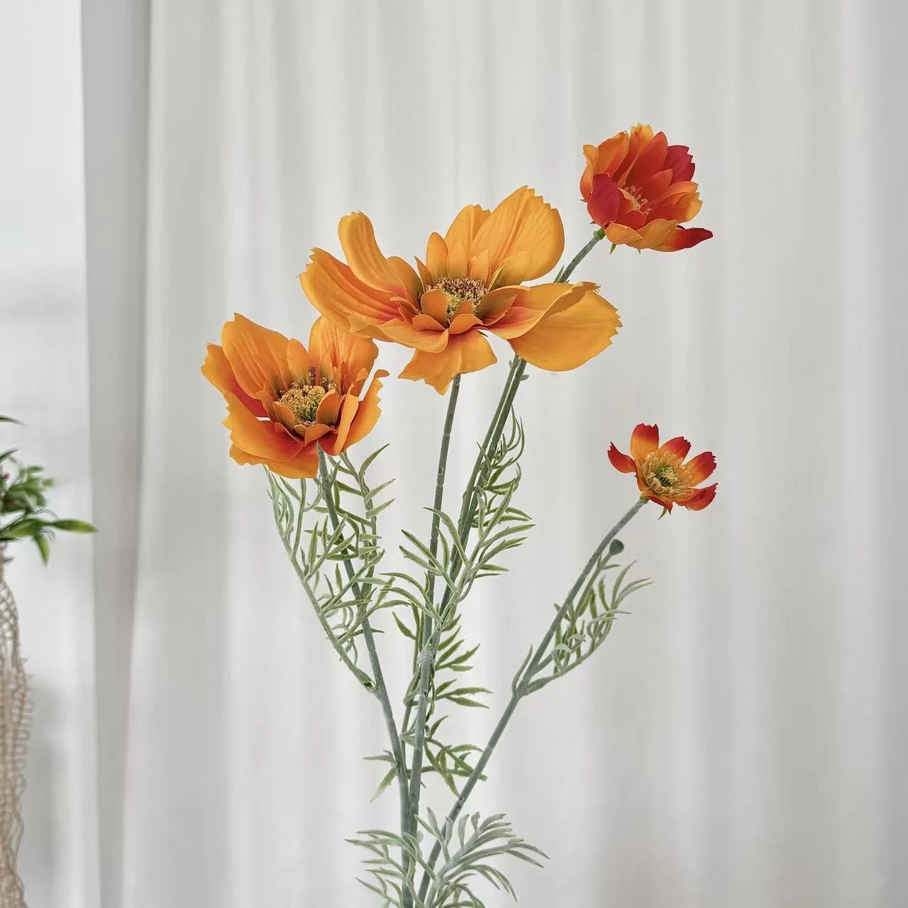 orange artificial cosmos flower spray