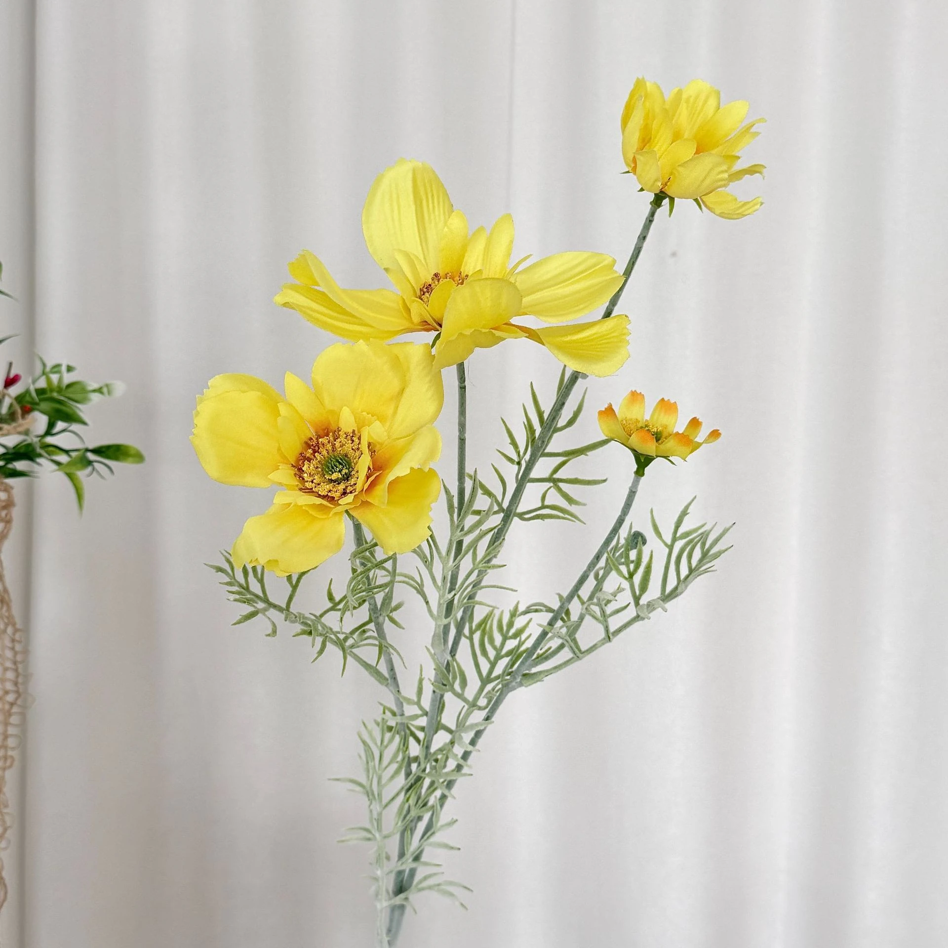 Alternate view of yellow artificial cosmos flower spray