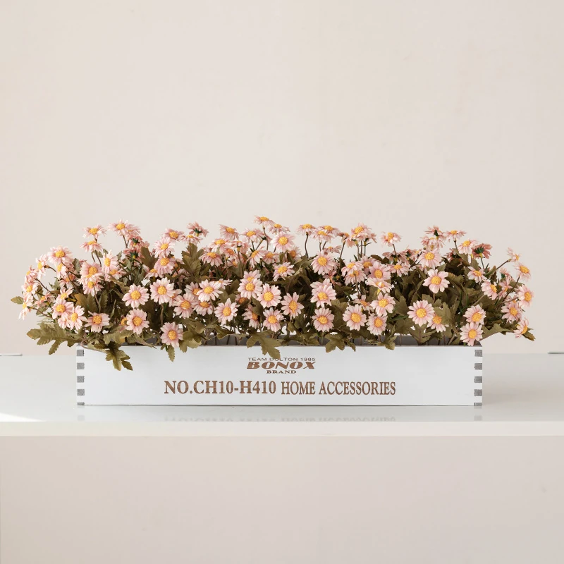 pink artificial daisy flower box centerpiece