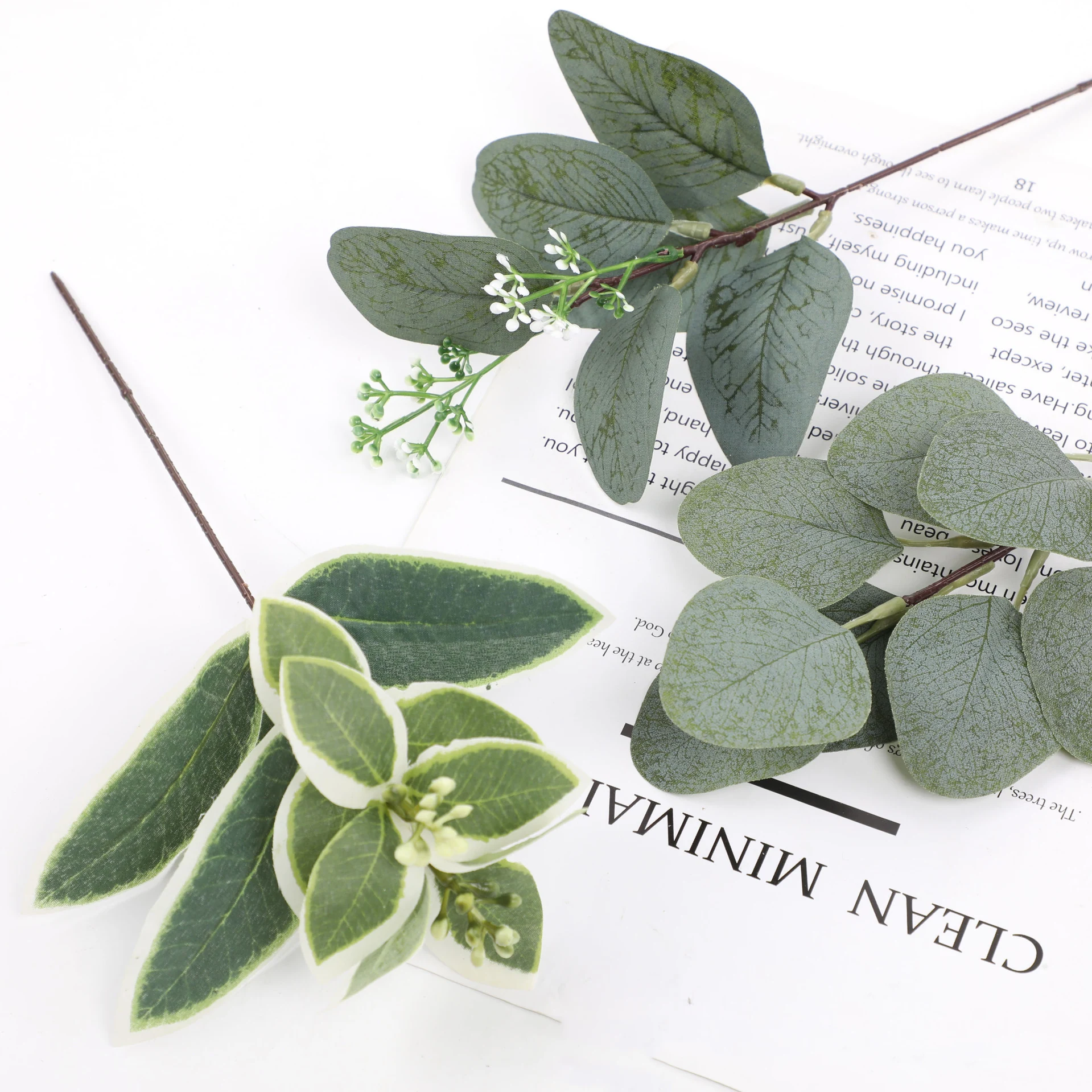 Close-up of style detail for artificial decorative foliage branch collection