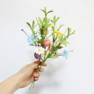 Handheld view of artificial easter egg flower pick