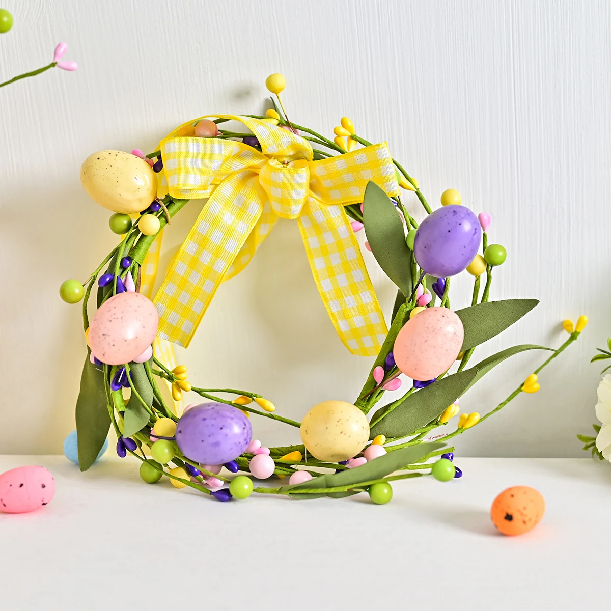 Artificial Easter Egg Twig Wreath shown in a decorative display