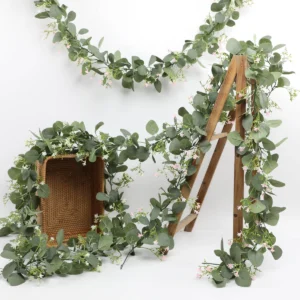 Artificial eucalyptus garlands with baby's breath arranged on display stands