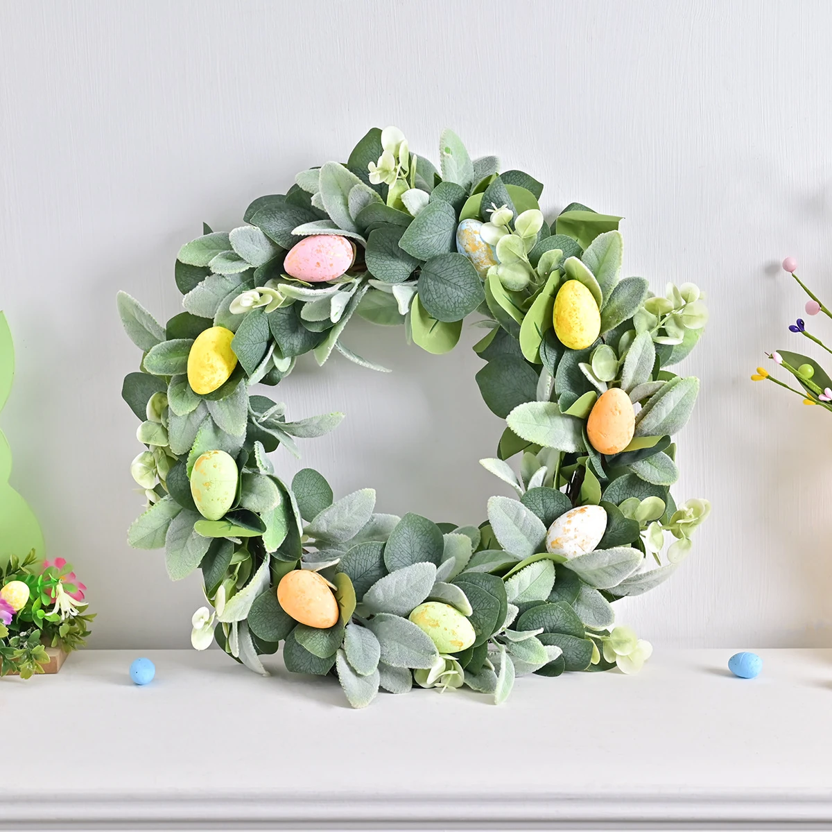 Artificial Eucalyptus Easter Egg Wreath shown in a decorative display