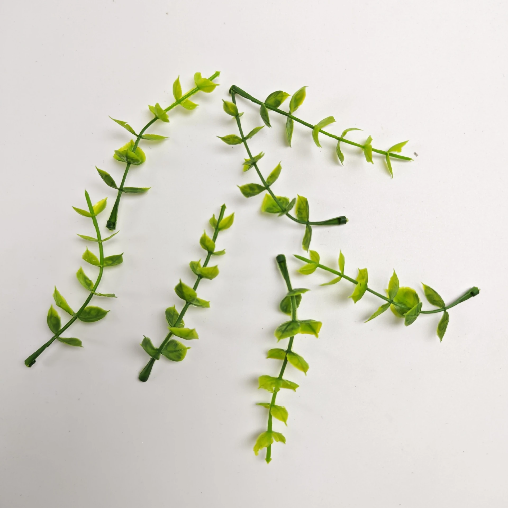 Group display of artificial Eucalyptus Leaf Pick