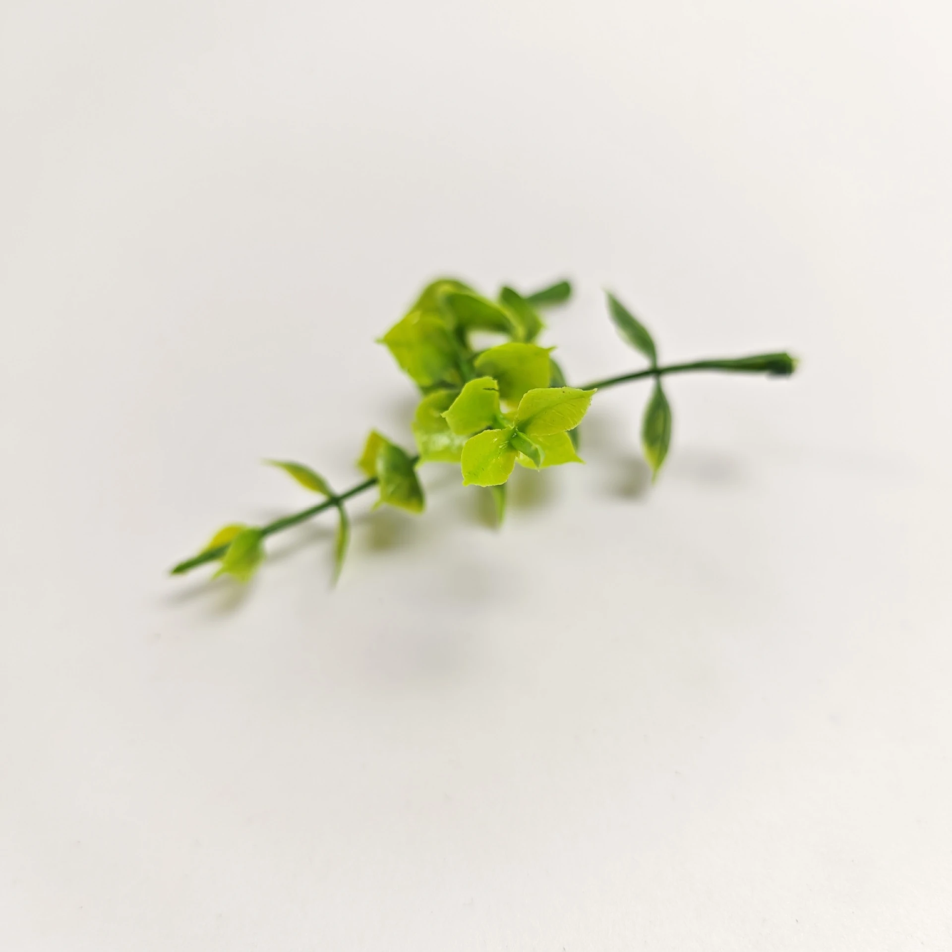 Side view of artificial Eucalyptus Leaf Pick