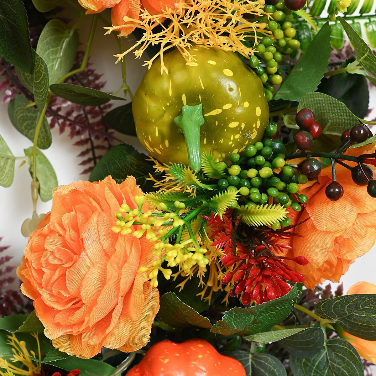 Close-up of pumpkin artificial fall pumpkin rose wreath