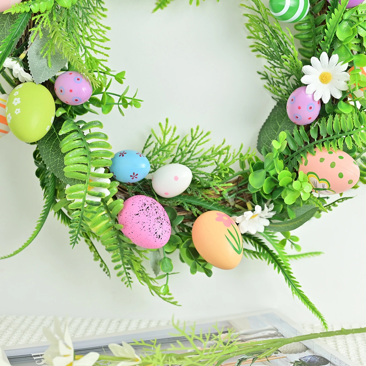 Close-up of detail artificial fern easter egg wreath