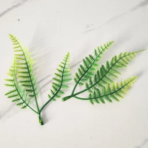 Artificial Fern Leaf Pick arranged for decorative display