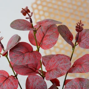 Close-up of red detail for artificial five-branch eucalyptus spray