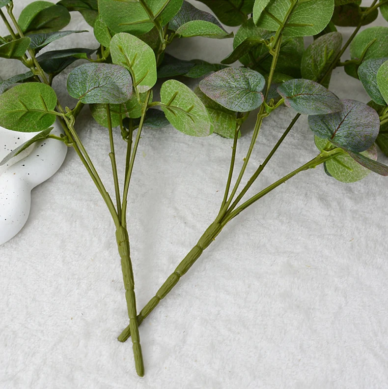 Close-up of stem detail for artificial five-branch eucalyptus spray