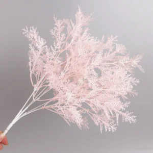 Close-up of artificial Flocked Asparagus Fern Bush branch