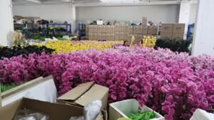 Artificial flowers packed in export cartons for international wholesale shipping