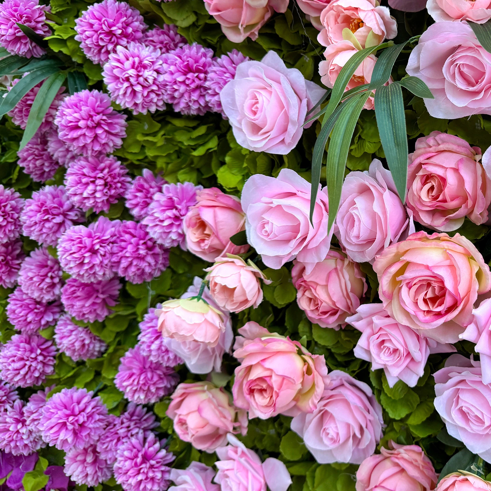 Close-up of purple rose artificial flower wall panel collection