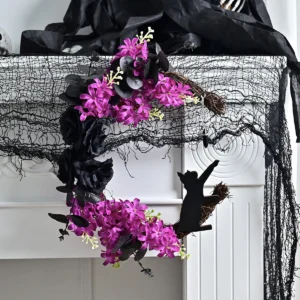 Artificial Halloween Bat Flower Wreath shown in a decorative display