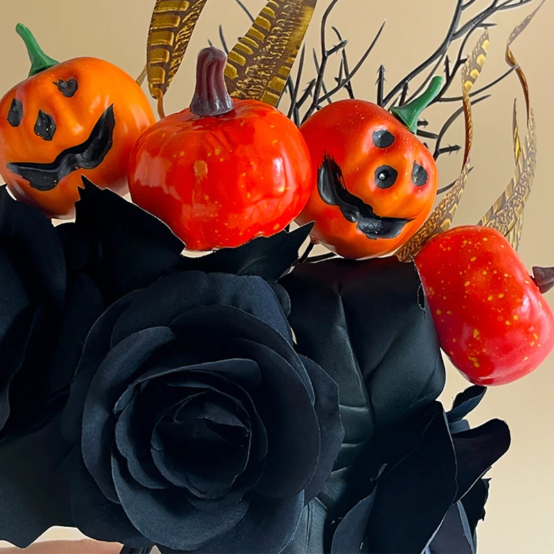Close-up of double pumpkin black rose artificial halloween pumpkin and black rose pick collection