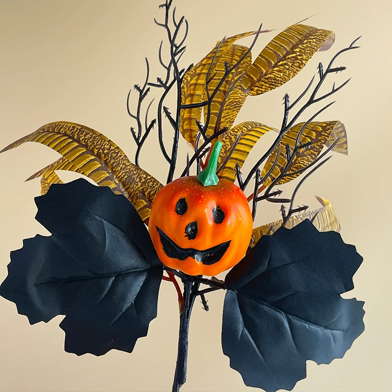 Close-up of jack o lantern black leaves artificial halloween pumpkin and black rose pick collection