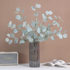 Artificial Iridescent Eucalyptus Spray displayed for vase