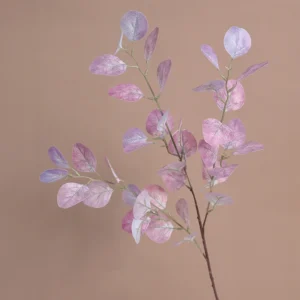 Close-up of pink purple artificial iridescent eucalyptus spray